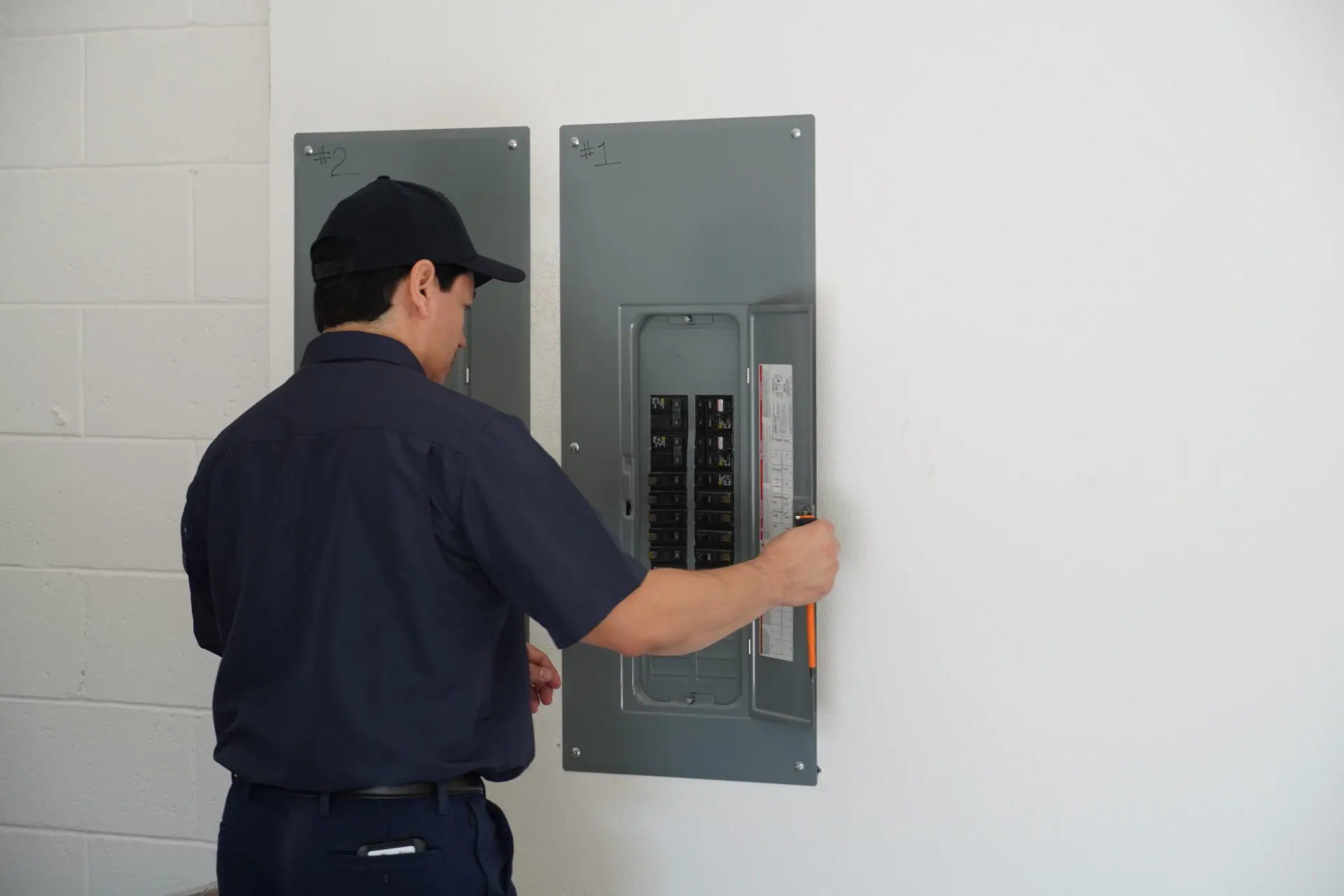 Strada Service Technician working on HVAC system