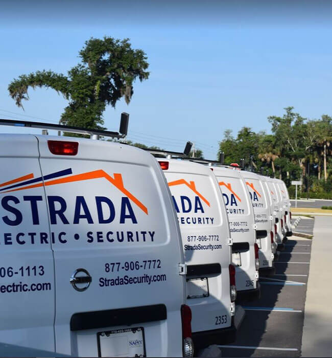 Strada services vans in parking lot