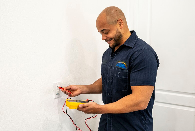 Strada Services technician working on electric services