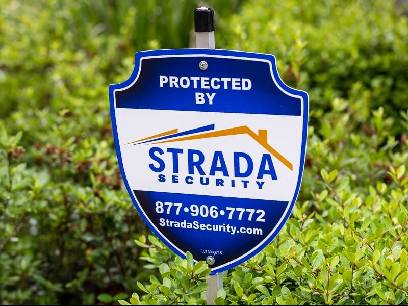 Protected by Strada Security yard sign